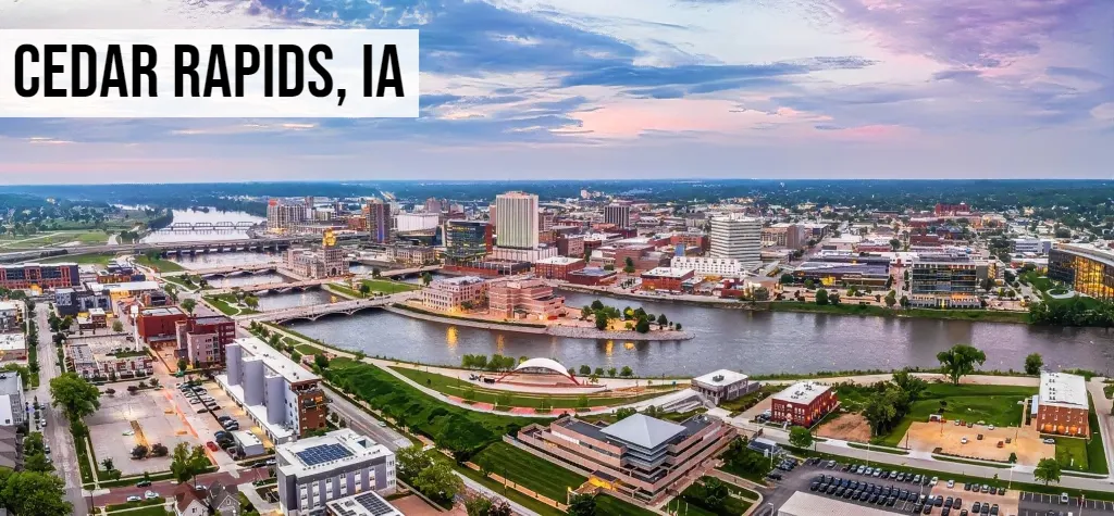 Cash Offer for Land Iowa – Cedar Rapids, IA Cedar Rapids, Iowa aerial view of downtown with riverfront, bridges, and surrounding neighborhoods