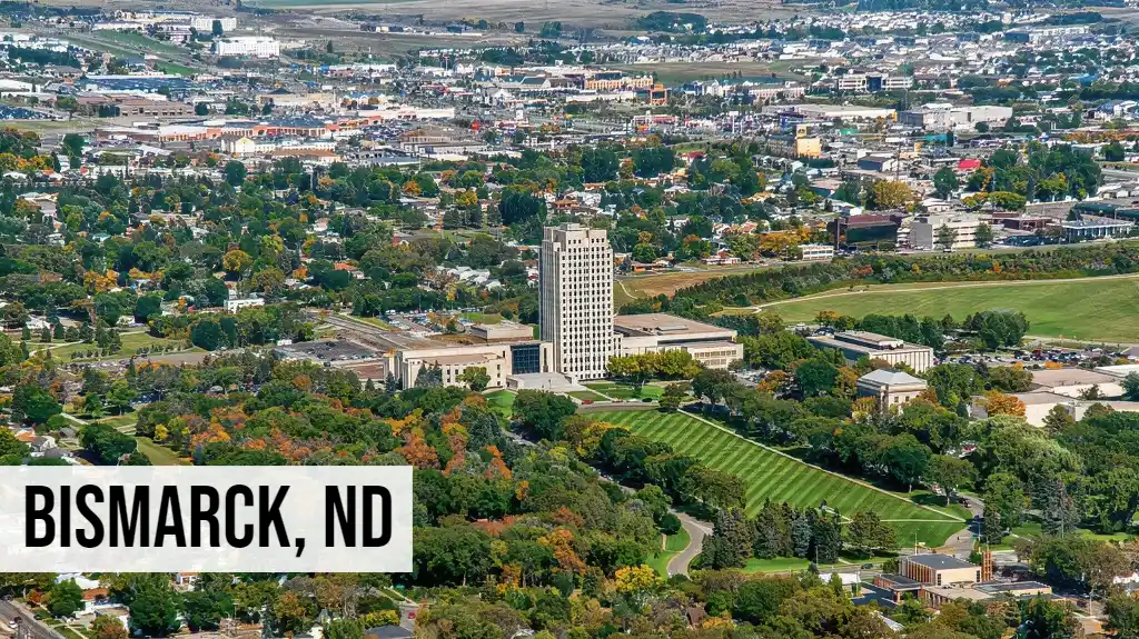 Bismarck, North Dakota aerial view of downtown with river, government buildings, and surrounding neighborhoods