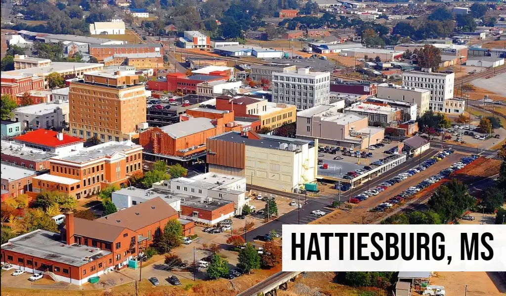 Hattiesburg, Mississippi aerial view of downtown with commercial buildings, streets, and surrounding city area