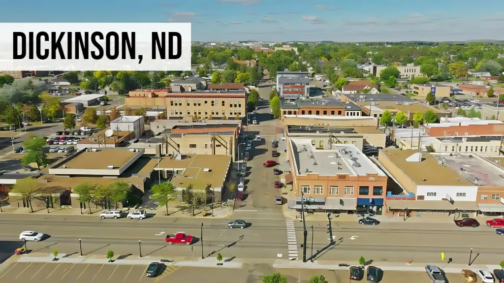 Dickinson, North Dakota aerial view of downtown streets, commercial buildings, and surrounding development