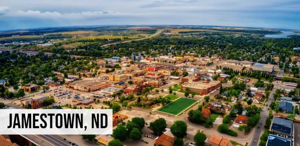 Jamestown, North Dakota aerial view of downtown area with streets, buildings, and surrounding neighborhoods