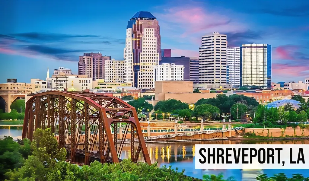 Shreveport, Louisiana skyline view along the Red River with downtown buildings, bridge, and waterfront