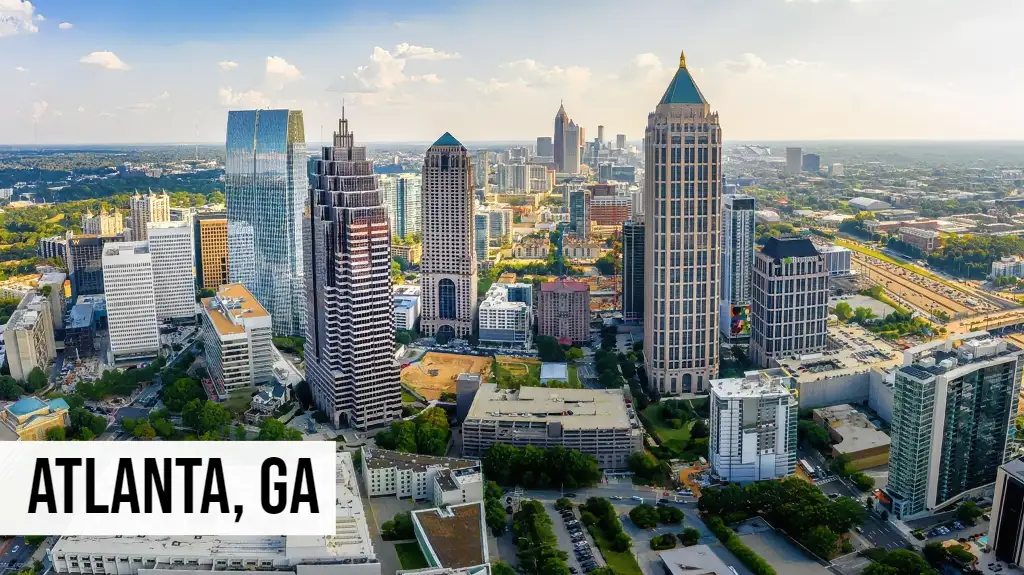 Atlanta, Georgia skyline with downtown skyscrapers, modern office buildings, and surrounding urban cityscape