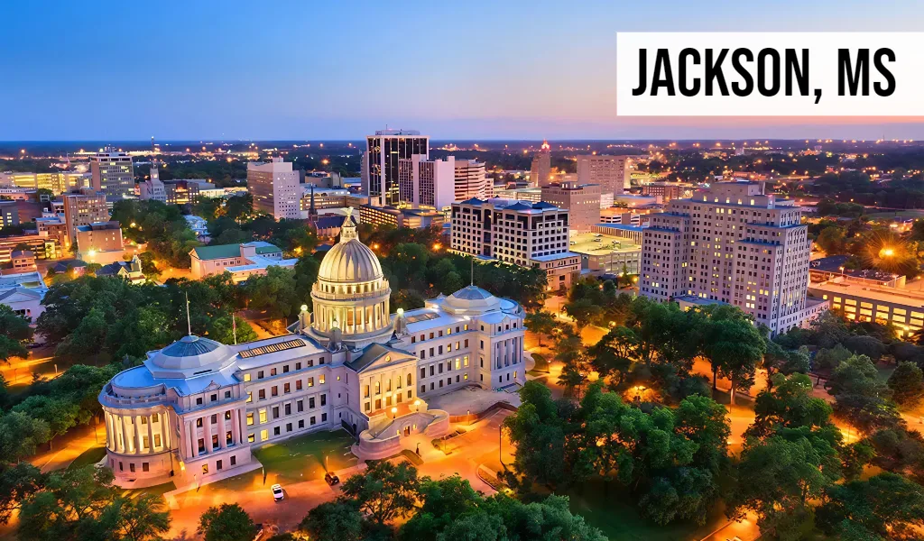 Jackson, Mississippi aerial view of downtown skyline with state capitol building, streets, and surrounding city area