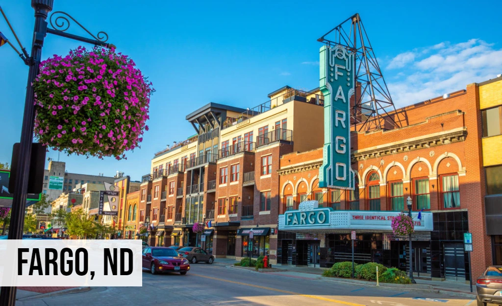 Fargo, North Dakota downtown street view with historic theater signage and surrounding commercial buildings