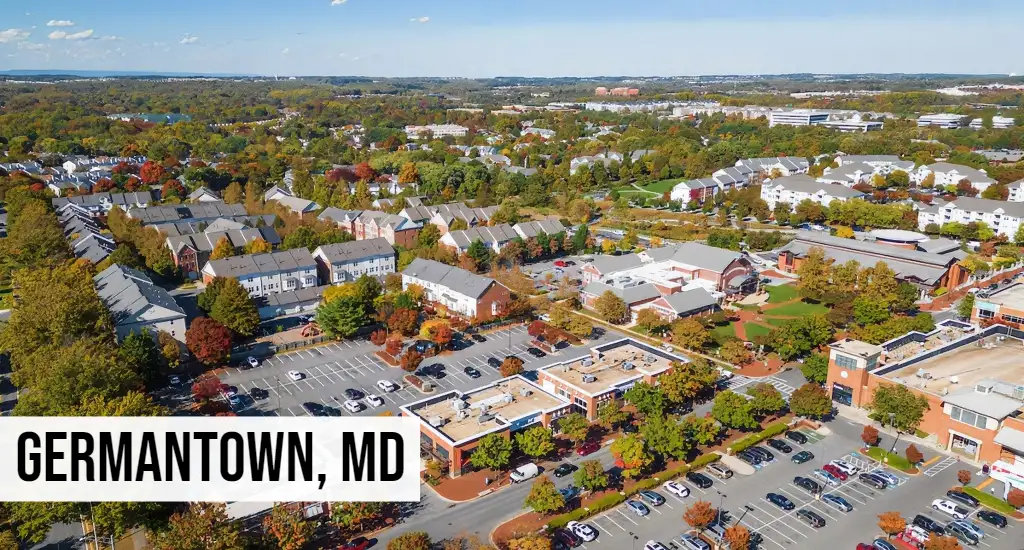 Germantown, Maryland aerial view of suburban neighborhoods with shopping centers, parking lots, streets, and surrounding area
