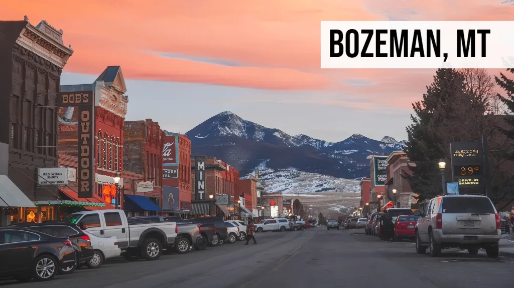 Bozeman, Montana downtown street view with historic buildings, mountain backdrop, and local shops