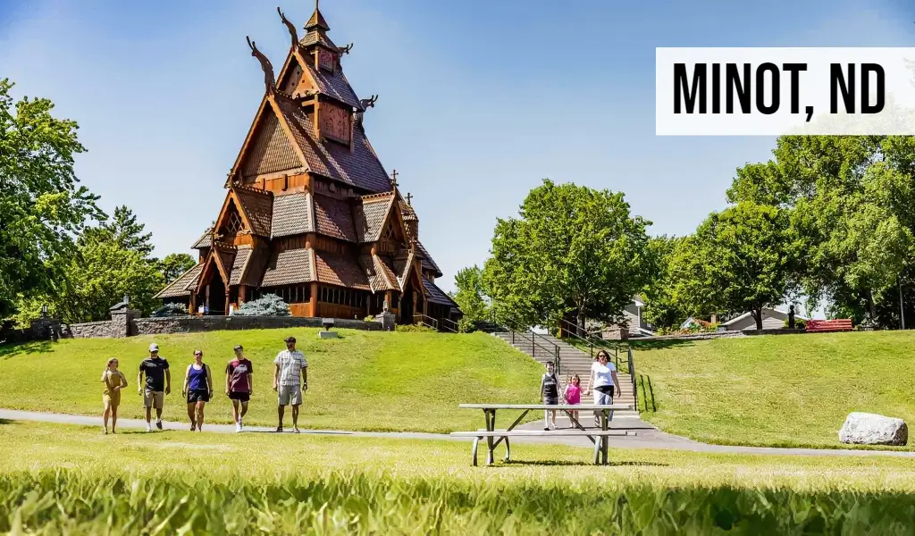 Minot, North Dakota park area with historic Scandinavian-style building and surrounding green space