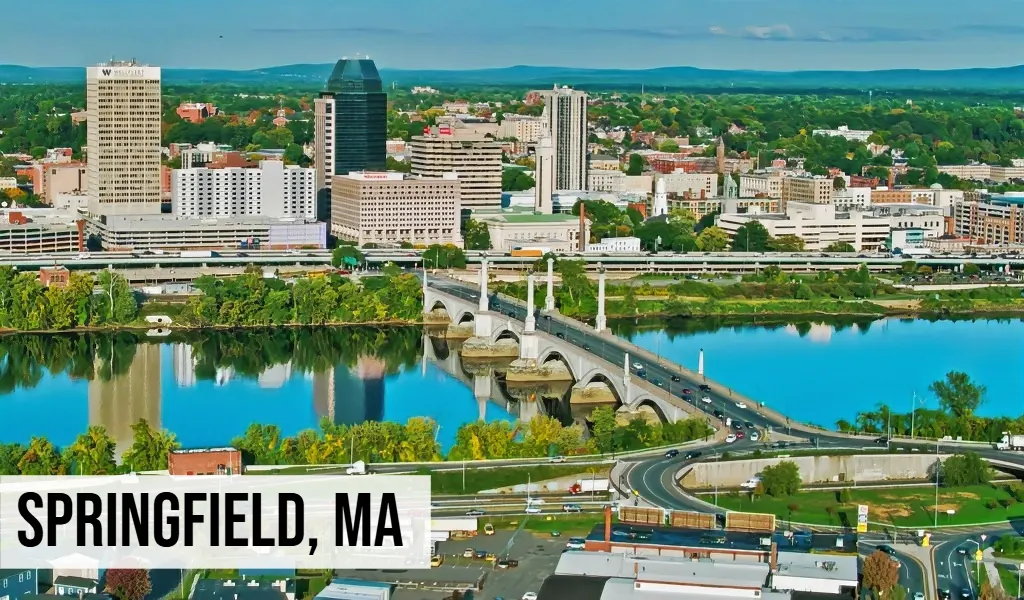 Springfield, Massachusetts skyline view along the Connecticut River with downtown buildings, bridges, and waterfront