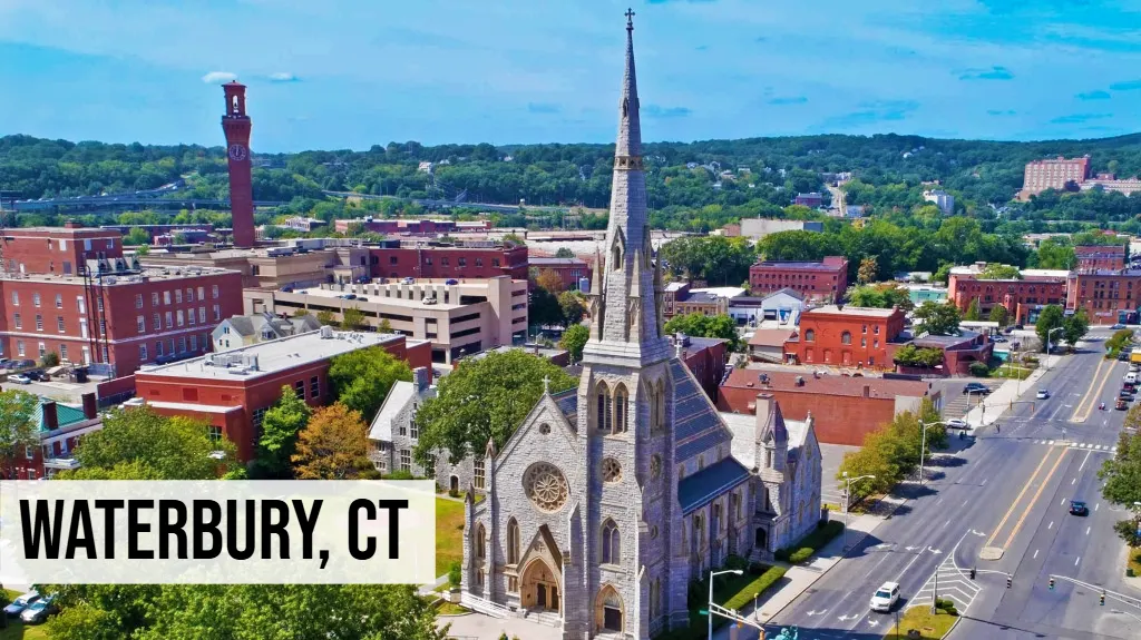 Waterbury, Connecticut aerial view of downtown with church steeple, streets, buildings, and surrounding neighborhood
