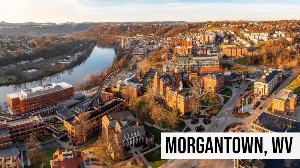 Morgantown, West Virginia aerial view of downtown neighborhoods, riverfront, and surrounding hills