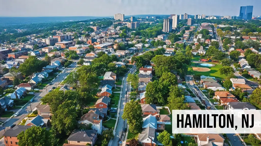 Hamilton, New Jersey aerial view of suburban neighborhoods with tree-lined streets, homes, and surrounding area