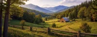 Blue Ridge Mountain farmland in North Carolina with rolling hills, red barn, and split-rail fence at golden hour – we buy land in NC.
